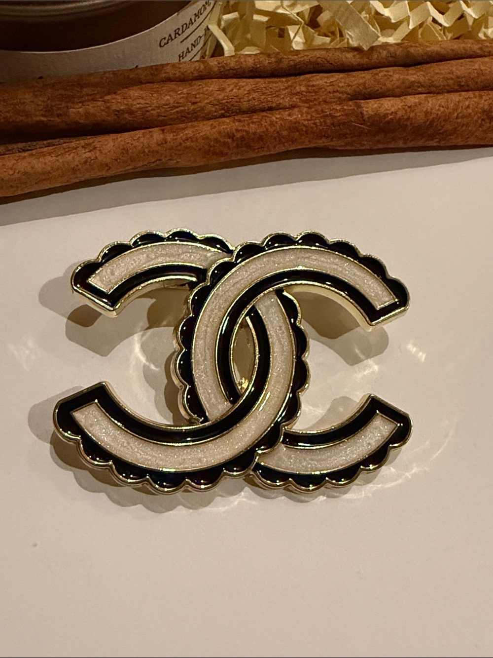 White and Black Interlocking CC Brooch